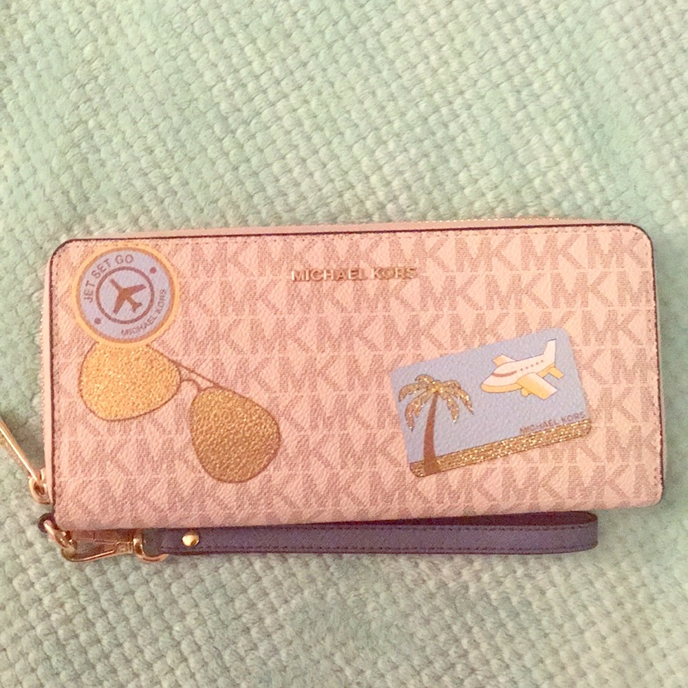 MK Jet Set Go Wristlet